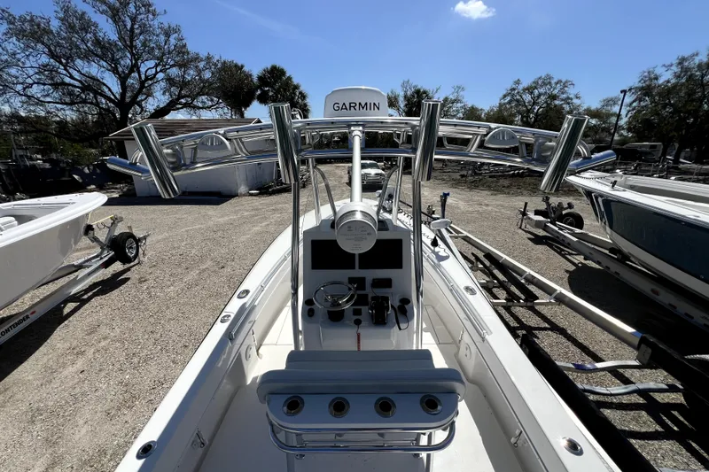 Slide: The Image of 2025 Contender 25 Tournament boat with Garmin equipment, parked outdoors under clear sky. - 18
