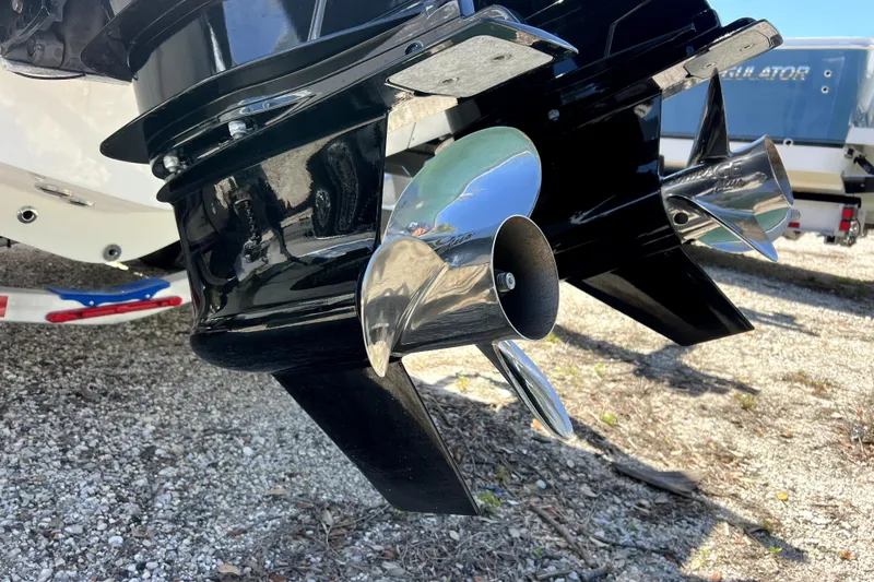 Slide: The Image of 2025 Contender 25 Tournament boat propellers on gravel surface, showcasing sleek design. - 20