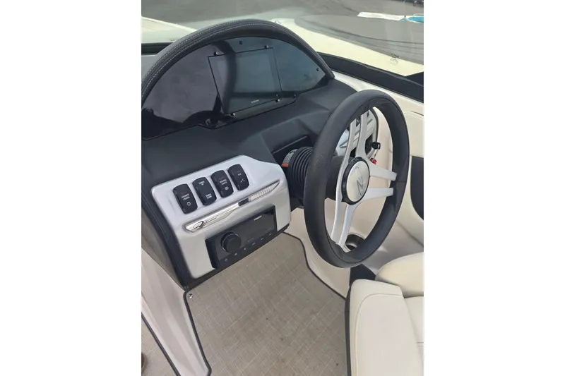 Slide: The Image of Interior view of a Regal 2000 ES boat helm, year 2022. - 5