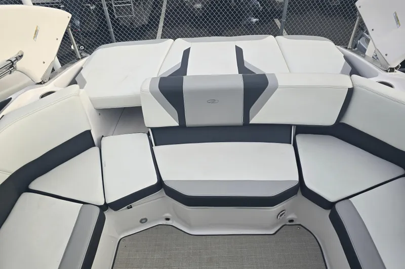 Slide: The Image of Interior of a 2022 Regal 2000 ES boat with gray and white seating. - 9