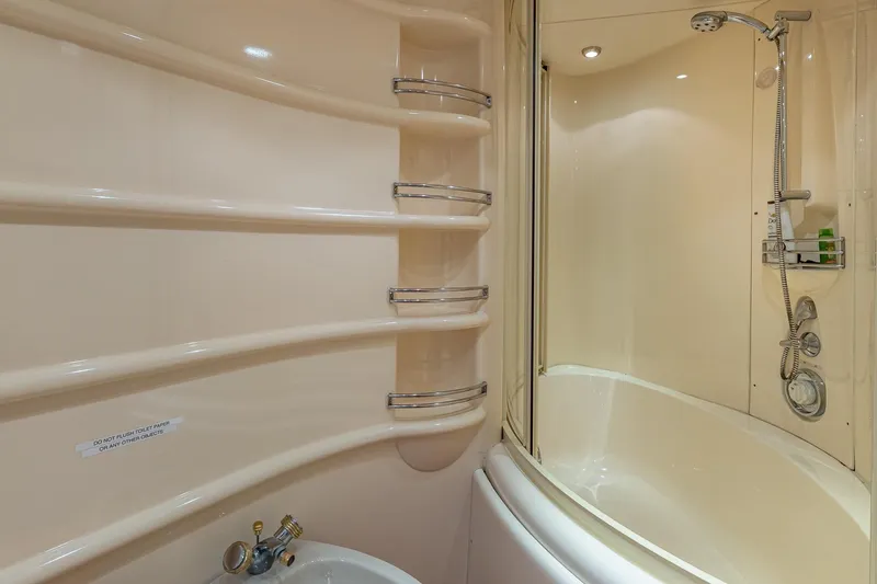 Slide: The Image of Luxurious bathroom in 2003 Azimut Fly 68 yacht with modern shower and sleek design. - 26
