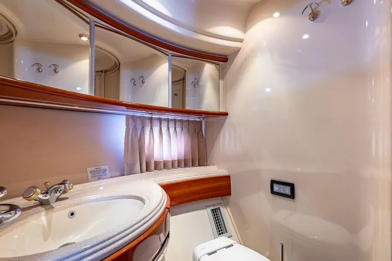 Slide: The Image of Luxurious bathroom interior of 2003 Azimut Fly 68 yacht with elegant fixtures and lighting. - 31