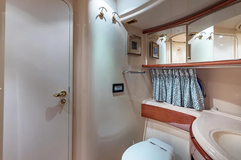 Slide: The Image of Luxurious bathroom interior of 2003 Azimut Fly 68 yacht with elegant fixtures and decor. - 36