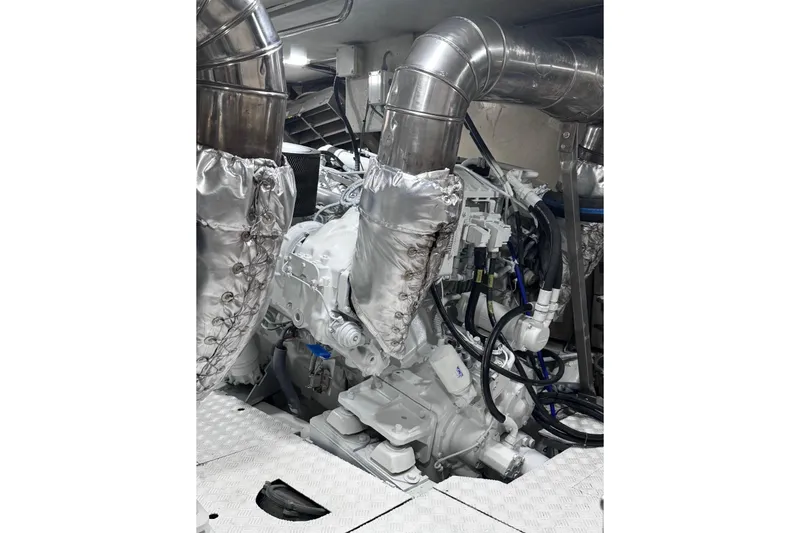 Slide: The Image of Engine room of 2003 Azimut Fly 68 yacht with insulated pipes and machinery. - 39