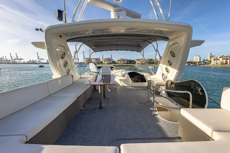 Slide: The Image of Luxurious 2003 Azimut Fly 68 yacht interior with spacious seating and ocean view. - 6