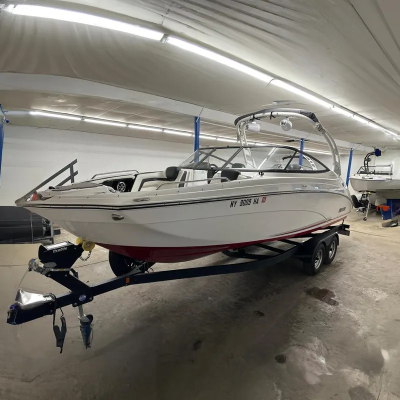 The Image of 2019 Yamaha Boats 242 Limited S on trailer in warehouse. - 0