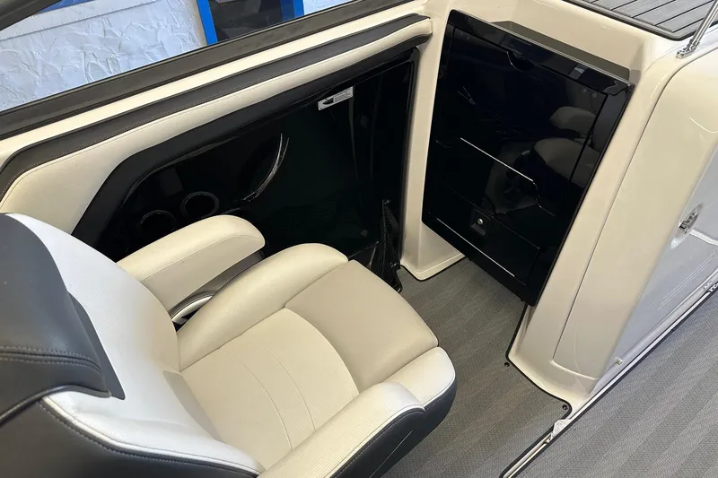 Slide: The Image of Interior of 2019 Yamaha Boats 242 Limited S, featuring sleek seating and modern design. - 5