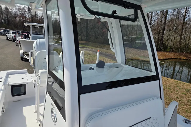 Slide: The Image of 2026 Sportsman Masters 247OE Bay Boat with sleek design and modern features. - 11