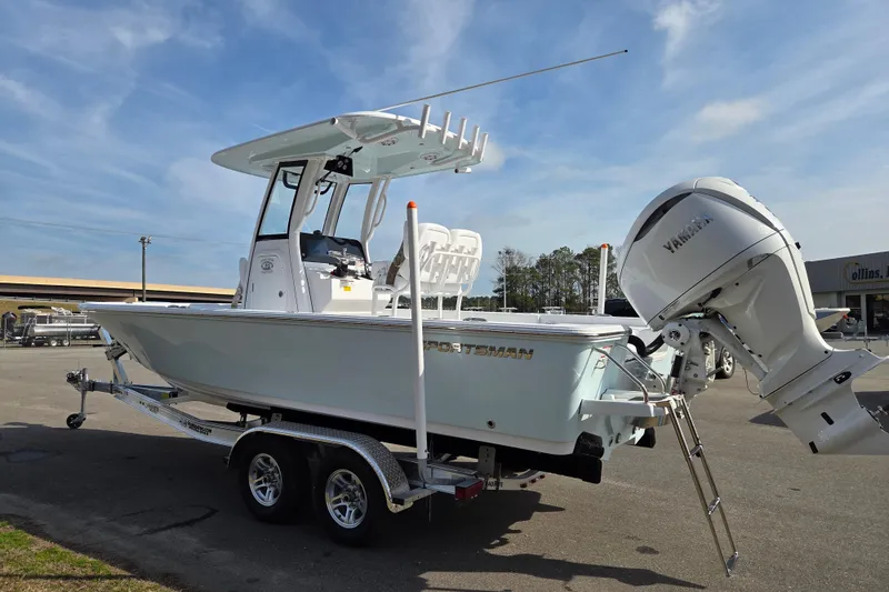 Slide: The Image of 2026 Sportsman Masters 247OE Bay Boat on trailer, featuring Yamaha outboard motor. - 5