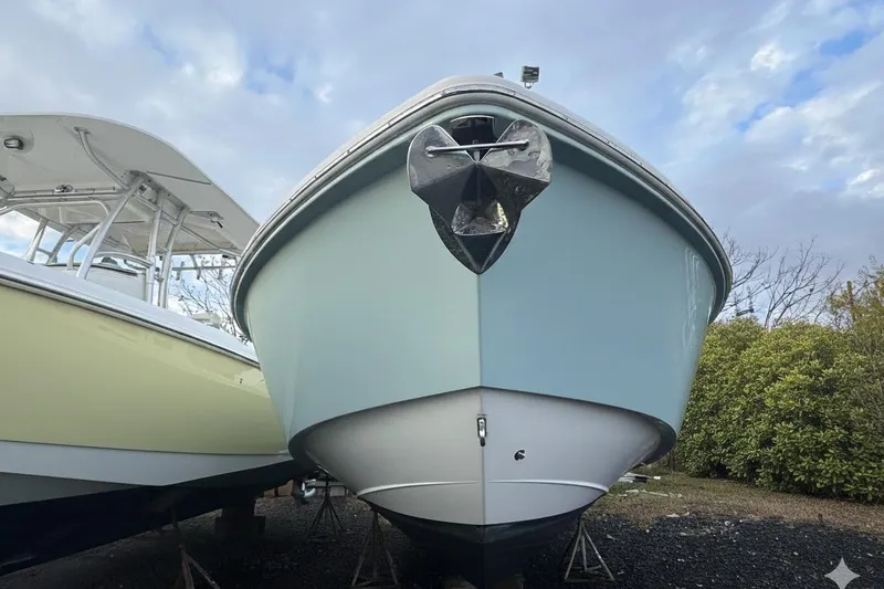 Slide: The Image of 2019 Everglades 273 Center Console boat on display, front view. - 4