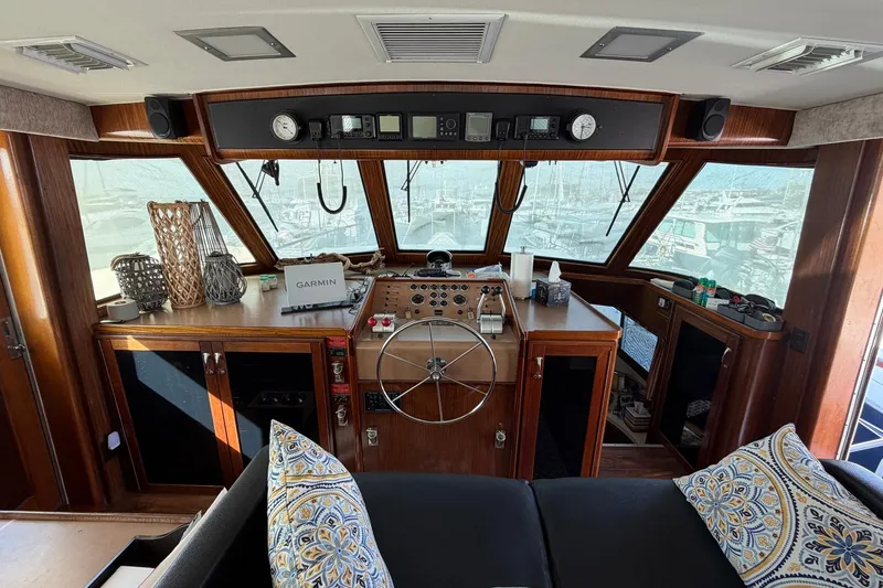 Slide: The Image of Interior of a 1987 Hatteras 58 Motor Yacht with helm and navigation equipment. - 37
