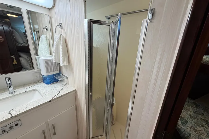 Slide: The Image of Bathroom interior of 1987 Hatteras 58 Motor Yacht with shower and vanity. - 51