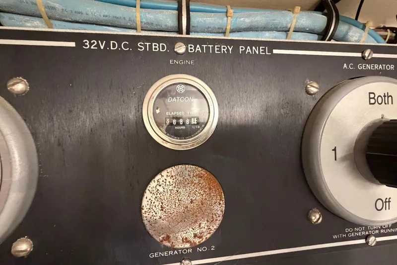 Slide: The Image of Control panel of a 1987 Hatteras 58 Motor Yacht with elapsed time gauge. - 78