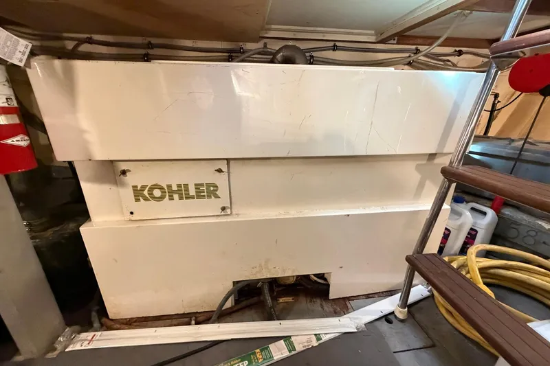 Slide: The Image of Engine room of 1987 Hatteras 58 Motor Yacht with Kohler generator. - 79