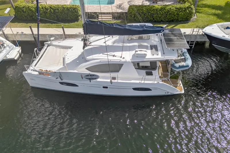 Slide: The Image of Cockpit of 2012 Leopard 39 yacht with navigation instruments and steering wheel. - 18