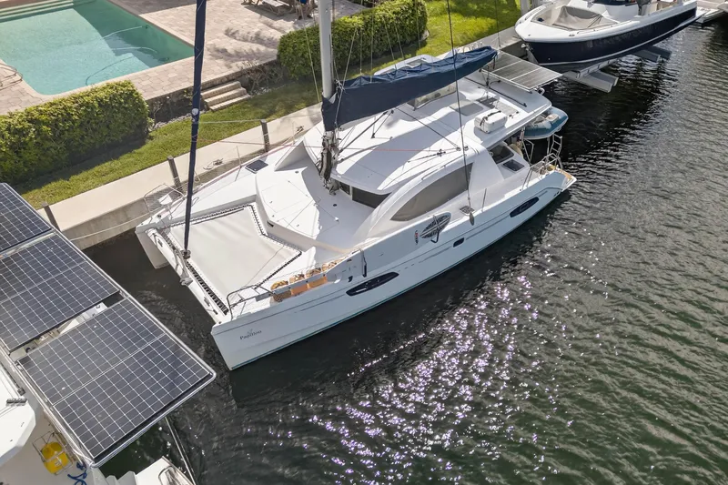 Slide: The Image of Aerial view of 2012 Leopard 39 catamaran docked near a pool and solar panels. - 19