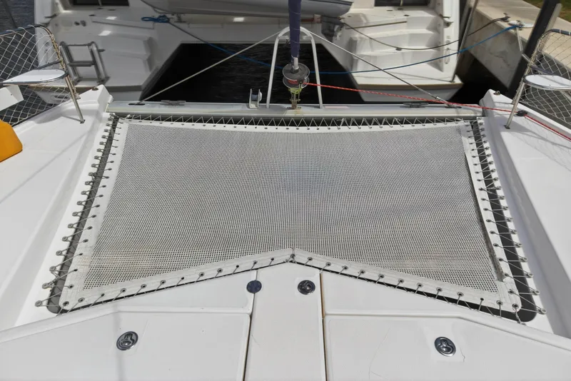 Slide: The Image of Trampoline deck of a 2012 Leopard 39 catamaran, featuring sturdy netting and sleek design. - 44