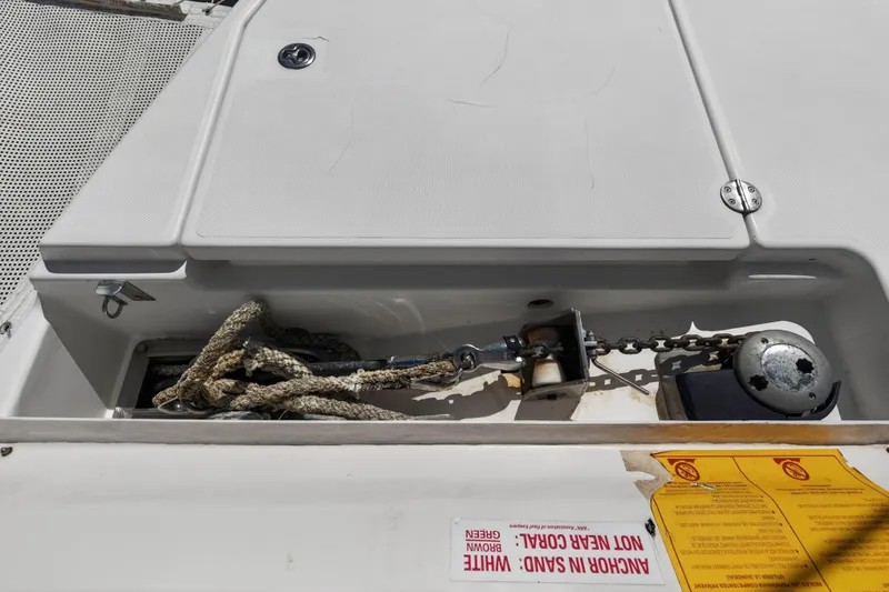 Slide: The Image of Anchor compartment of a 2012 Leopard 39 catamaran with ropes and chain. - 46