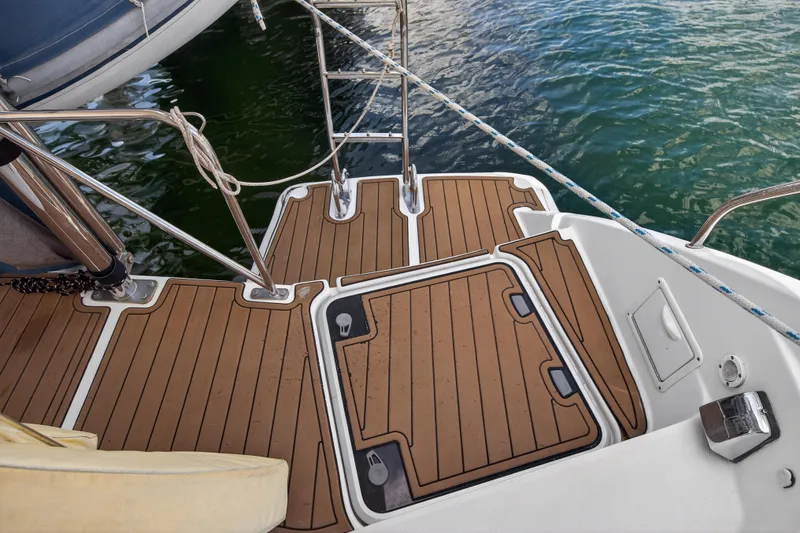 Slide: The Image of Sailing yacht Leopard 39, 2012 model, featuring teak deck and stainless steel railings. - 51