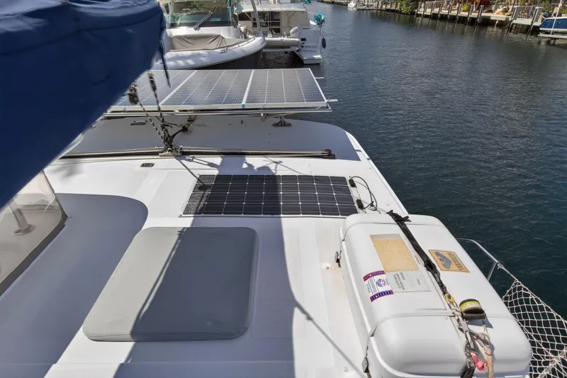 Slide: The Image of 2012 Leopard 39 catamaran with solar panels and safety equipment on deck. - 65