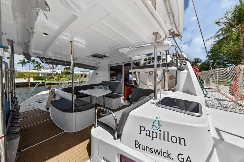 Slide: The Image of Leopard 39 catamaran interior, 2012 model, docked in Brunswick, GA, featuring outdoor seating. - 7