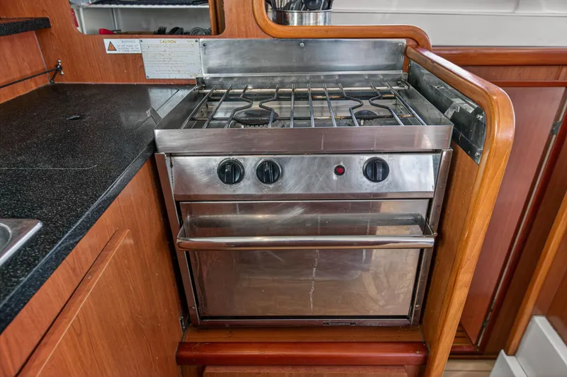 Slide: The Image of Stainless steel stove and oven in 2012 Leopard 39 yacht kitchen. - 76
