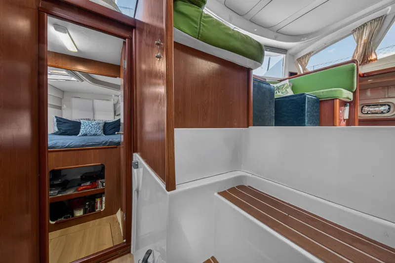 Slide: The Image of Interior of 2012 Leopard 39 yacht with cozy cabin and vibrant seating area. - 88