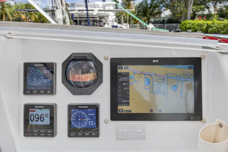 Slide: The Image of Control panel of a 2012 Leopard 39 sailboat with navigation instruments and digital display. - 9
