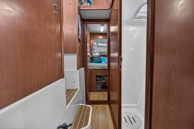 Slide: The Image of Interior of 2012 Leopard 39 yacht with wooden finishes and cozy cabin. - 90