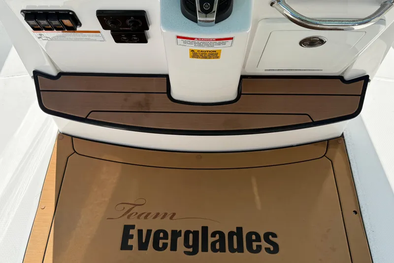 Slide: The Image of 2022 Everglades 273 Center Console boat deck with "Team Everglades" branding. - 12