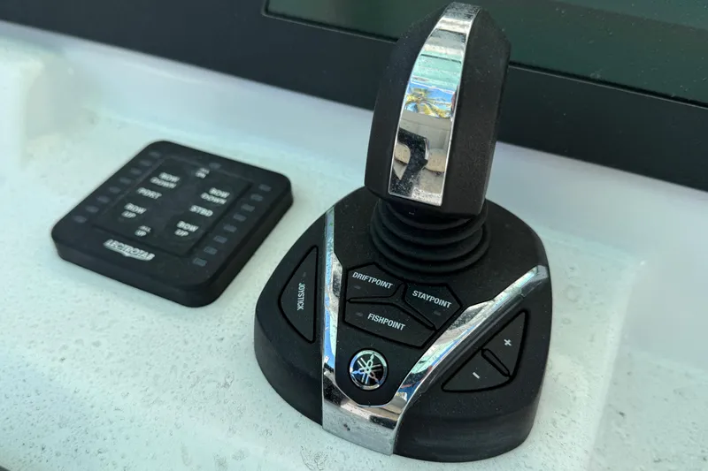 Slide: The Image of Joystick control panel on 2022 Everglades 273 Center Console boat. - 14