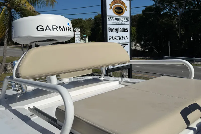 Slide: The Image of 2022 Everglades 273 Center Console boat with Garmin radar and beige seating. - 18