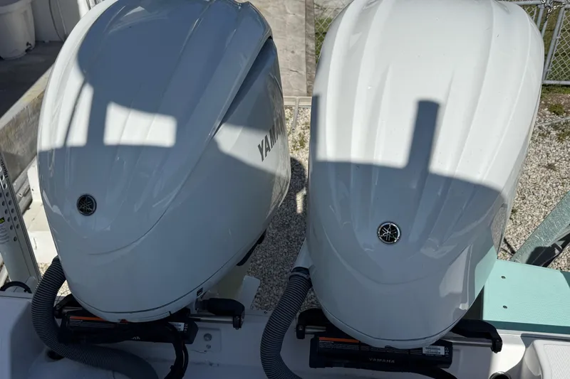 Slide: The Image of Twin Yamaha outboard engines on a 2022 Everglades 273 Center Console boat. - 26