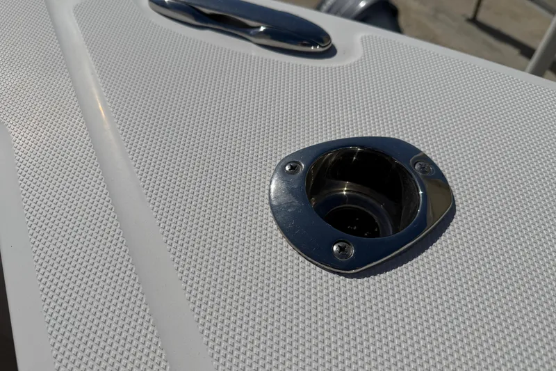 Slide: The Image of Close-up of Everglades 273 Center Console 2022 boat deck with metal fitting. - 4