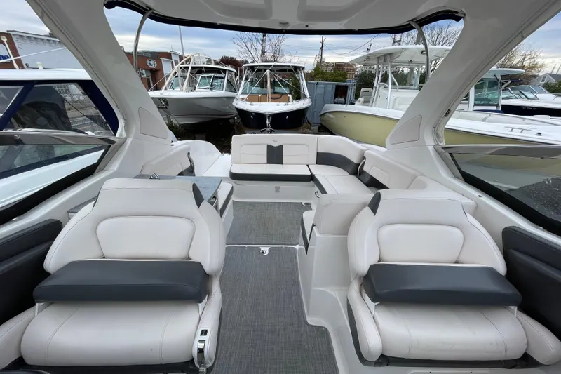 Slide: The Image of 2017 Chaparral 307 SSX boat interior with luxurious seating and modern design. - 5
