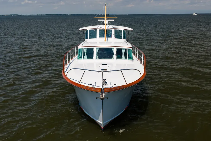 Slide: The Image of 1958 Rybovich 54 Yachtfish on open water, showcasing classic design and elegance. - 5