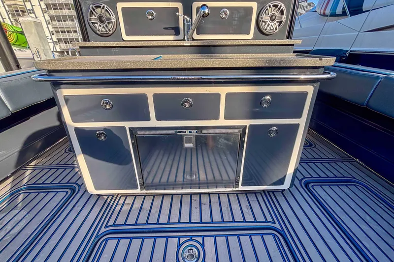 Slide: The Image of 2016 Hydra-Sports 4200 Siesta boat interior with sleek cabinetry and modern design. - 11