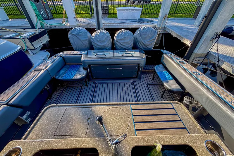 Slide: The Image of 2016 Hydra-Sports 4200 Siesta boat interior with seating and fishing amenities. - 14