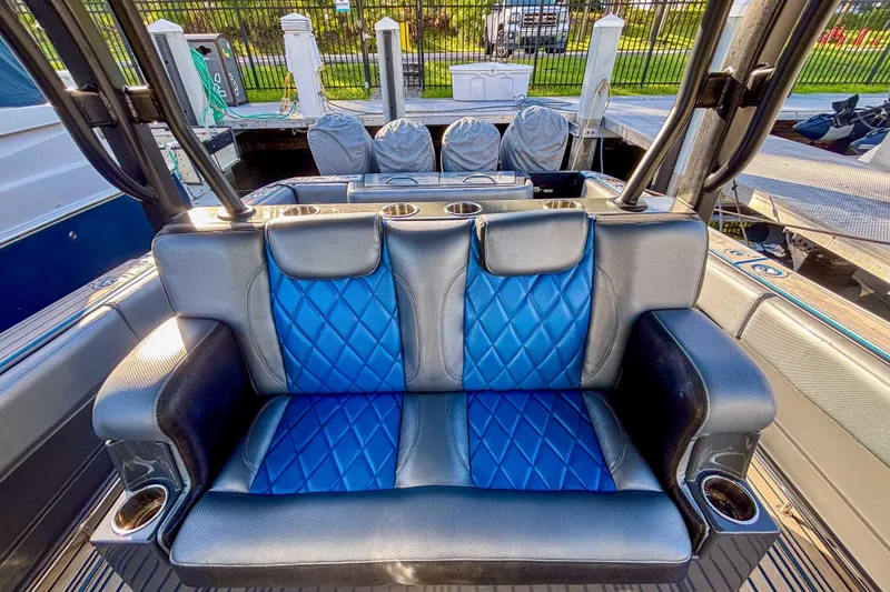 Slide: The Image of 2016 Hydra-Sports 4200 Siesta boat seat with blue diamond-pattern upholstery. - 15