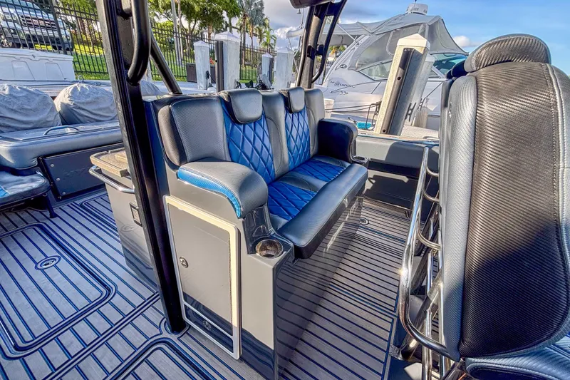 Slide: The Image of 2016 Hydra-Sports 4200 Siesta boat interior with luxurious seating and sleek design. - 16