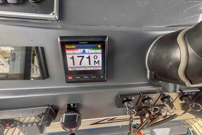 Slide: The Image of Garmin display on 2016 Hydra-Sports 4200 Siesta boat dashboard showing 171° heading. - 23