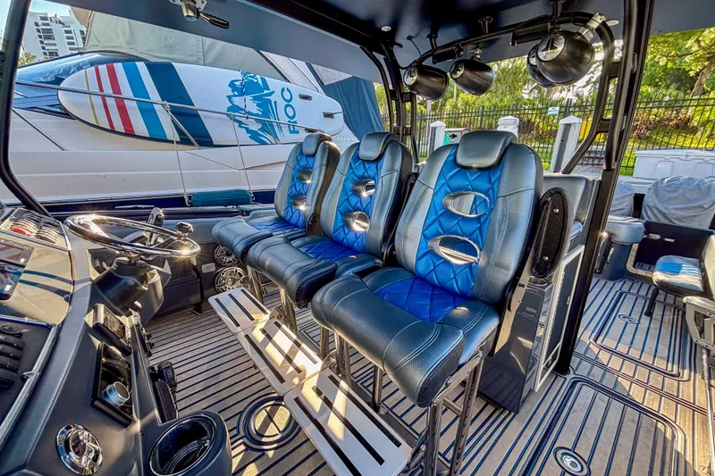 Slide: The Image of Interior of 2016 Hydra-Sports 4200 Siesta boat with blue leather seating. - 29