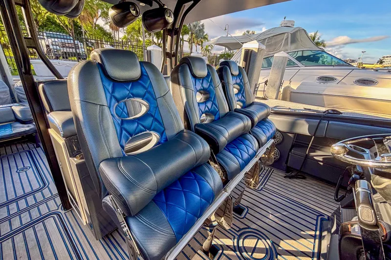 Slide: The Image of Interior of 2016 Hydra-Sports 4200 Siesta boat with luxurious blue seating. - 32