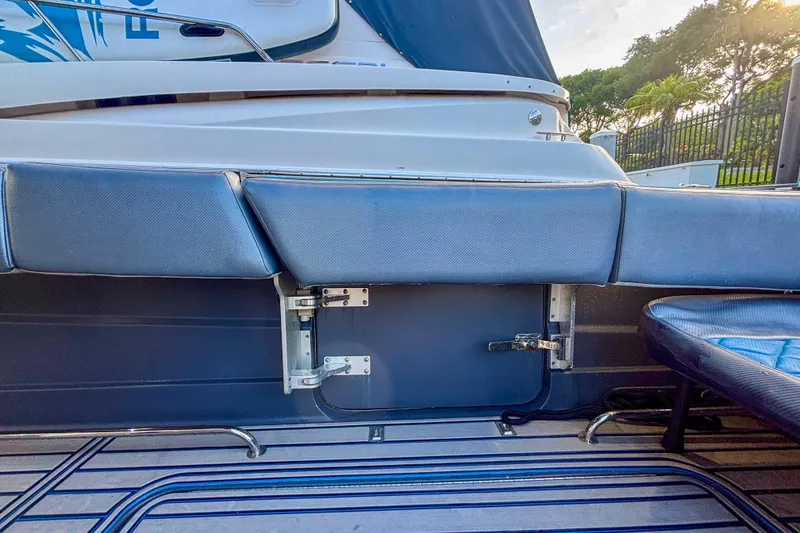 Slide: The Image of 2016 Hydra-Sports 4200 Siesta boat interior with cushioned seating and sleek design. - 4