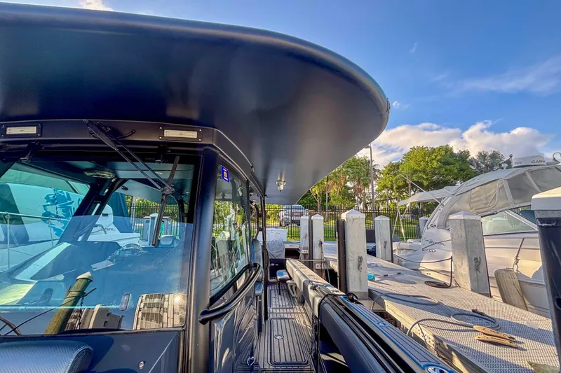 Slide: The Image of 2016 Hydra-Sports 4200 Siesta boat docked under clear blue sky. - 41