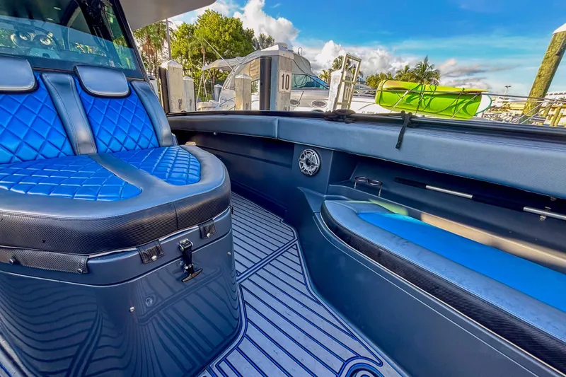 Slide: The Image of 2016 Hydra-Sports 4200 Siesta boat interior with blue quilted seats and sleek design. - 43