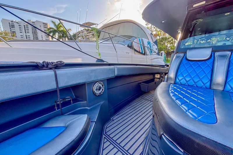 Slide: The Image of 2016 Hydra-Sports 4200 Siesta boat interior with blue seating and modern design. - 46