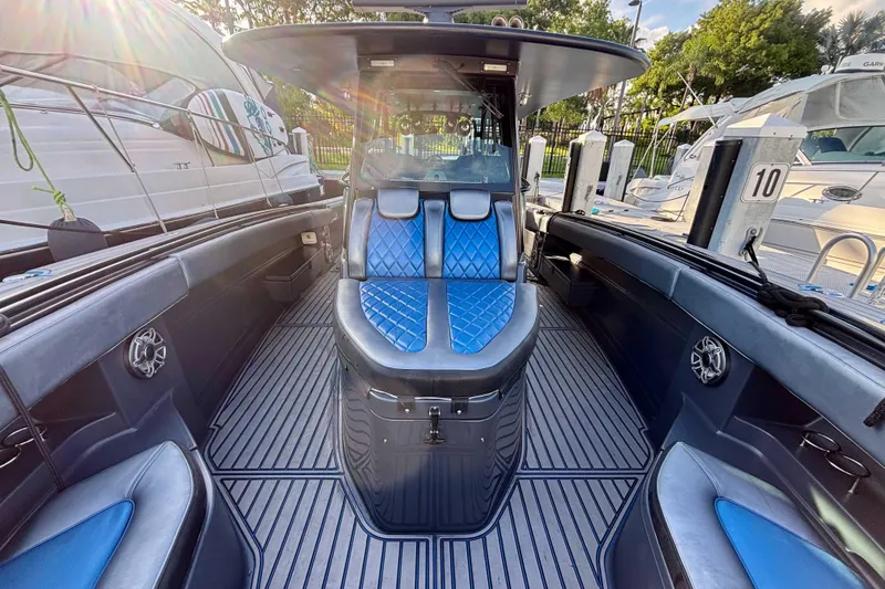 Slide: The Image of 2016 Hydra-Sports 4200 Siesta boat interior with blue seating and sleek design. - 47