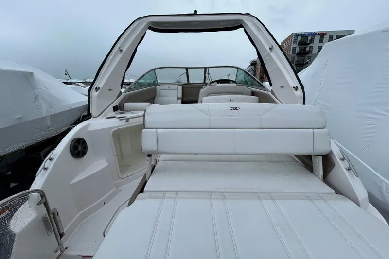 Slide: The Image of 2017 Regal 28 Express boat interior with white seating and modern design. - 4