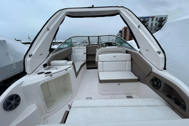 Slide: The Image of 2017 Regal 28 Express boat interior with white seating and modern design. - 5